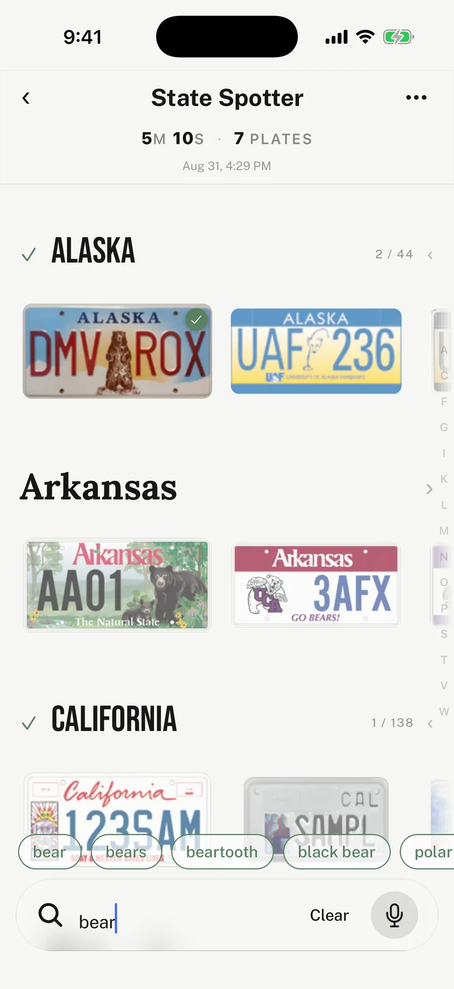 The same board filtered by the search term 'bear', with suggested tag chips reading bear, bears, beartooth and black bear above the search field, and only bear plates from Alaska, Arkansas and California left on the board.